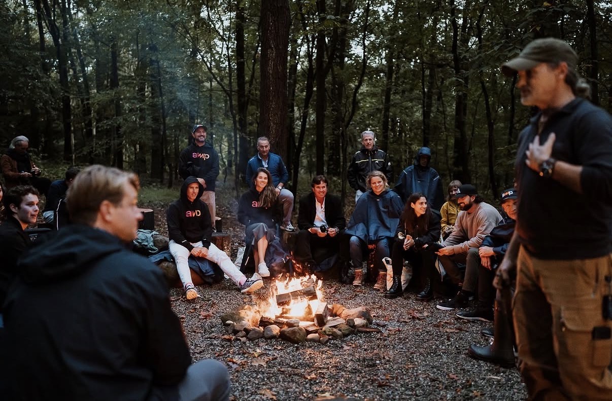 Faculty leading fire ceremony circle