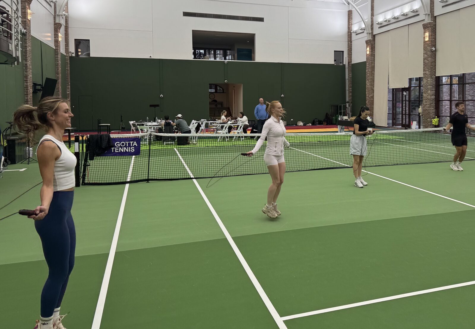 Group movement session on the indoor tennis court